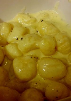 A picture of Creamy, cheesy gnocchi.
