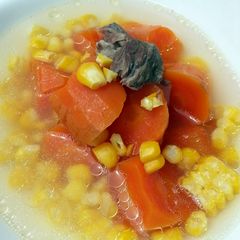 A picture of Carrot And Corn In Pork Soup.
