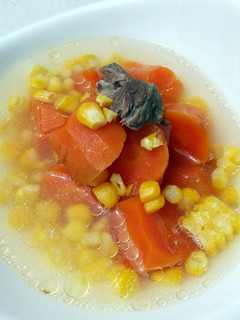 A picture of Carrot And Corn In Pork Soup.