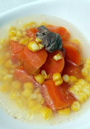 A picture of Carrot And Corn In Pork Soup.