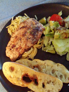 A picture of Pan seared Salmon with Garlic lemon pasta.