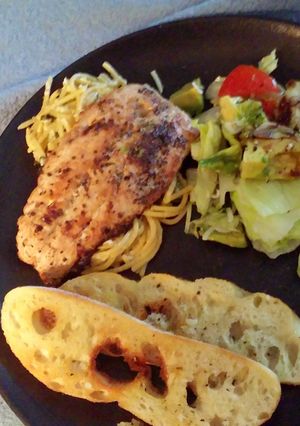 A picture of Pan seared Salmon with Garlic lemon pasta.