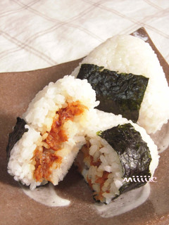A picture of Rice Balls with Umeboshi and Bonito Flakes.