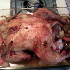 A picture of Whole roasted apple & garlic chicken.