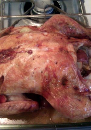 A picture of Whole roasted apple & garlic chicken.