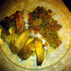 A picture of L's Sweet Chicken Wings with Peas & Carrots.