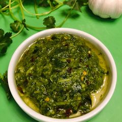 A picture of Homemade cilantro chimichurri sauce.
