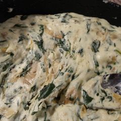 A picture of The bomb artichoke spinach dip.