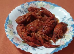 Foto principal de Cangrejos de río con tomate y toque picante