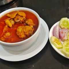 A picture of Kolhapuri Chicken Curry.