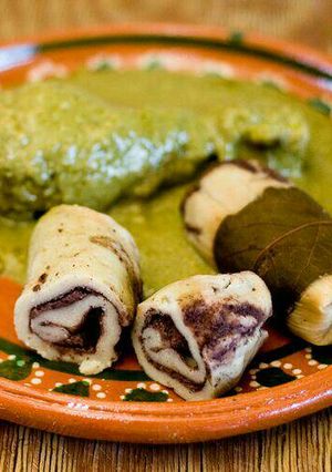 Una foto de Tamales de frijol negro