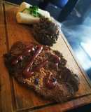 Bistek a la plancha con lentejas y palmitos