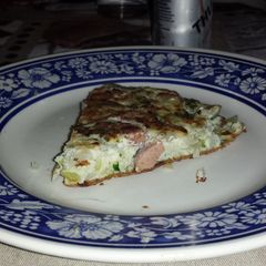 A picture of Onion and sausage omelette.