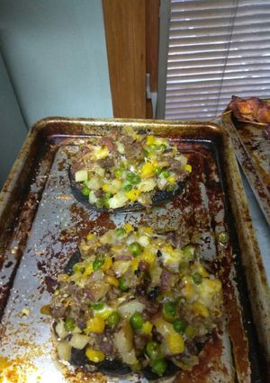 A picture of Yummy super Stuffed mushrooms.
