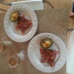 A picture of Baked eggs in avocado.