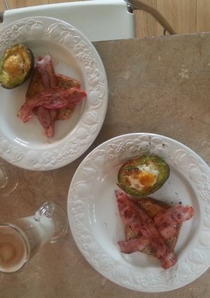 A picture of Baked eggs in avocado.