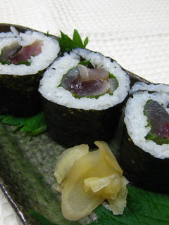 A picture of Cured Mackerel Maki Sushi.