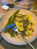 Truffle tortellini with creamy mushroom and sage sauce, and asparagus side