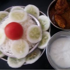 A picture of Jeera rice bottle guard(lauki)kofte and curd.