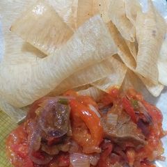 A picture of Yam flakes with sauce.