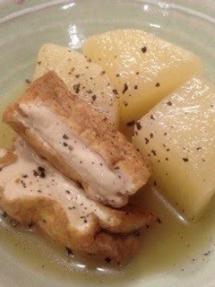 A picture of Simmered Daikon & Atsuage Seasoned With Consomme.