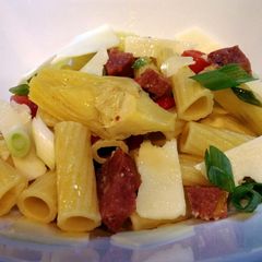 A picture of Antipasto pasta with artichokes.