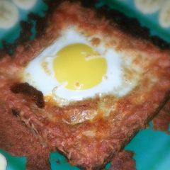 A picture of Toasty Baked Egg In a Basket.