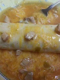 A picture of Smothered Beef and Bean Burritos.