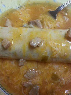 A picture of Smothered Beef and Bean Burritos.