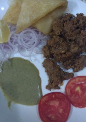 A picture of Bihari beef boti with Pori paratha.