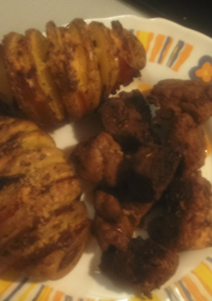 Una foto de Patatas hasellback con carne adobada