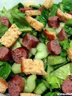 A picture of sausage salad.