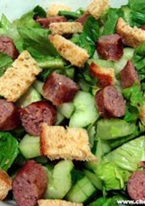 A picture of sausage salad.