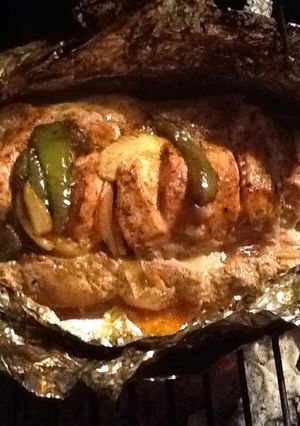 A picture of Grilled Tenderloin With Peppers And Onions.