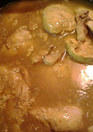 A picture of Chicken in sage onion turmeric sauce.