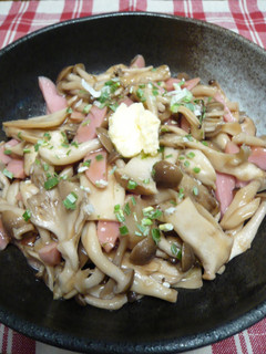 A picture of Stir-Fried Mushrooms and Fish Sausage with Butter Ponzu Sauce.