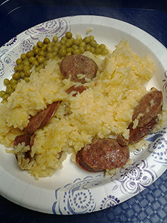 A picture of Sausage and buttery saffron rice.
