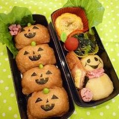 Jack-o'-Lantern Inari Sushi For Halloween Character Bentos A picture of Jack-o'-Lantern Inari Sushi For Halloween Character Bentos.