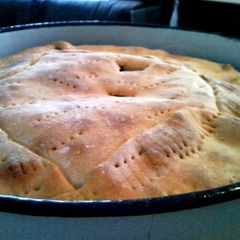A picture of Luchnick - Bread with Meat and Onions.