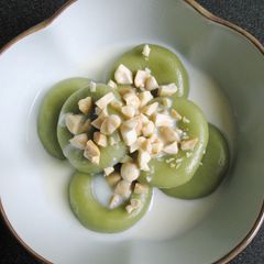 A picture of Matcha Dango With Sweet Milk Sauce.