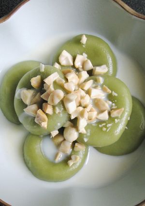 A picture of Matcha Dango With Sweet Milk Sauce.