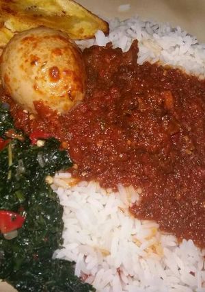 A picture of Rice & Stew with Veg sauce.