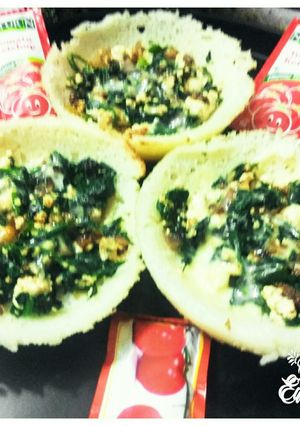 A picture of Rava Bowl Spinach Pizzas.
