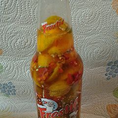 Kumquat and Birdseye chili infused sauce A picture of Kumquat and Birdseye chili infused sauce.