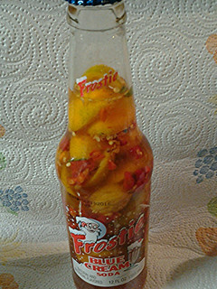 A picture of Kumquat and Birdseye chili infused sauce.