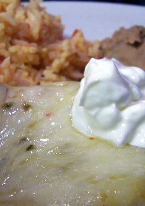 A picture of Green Chile Pepper Jack Chicken Enchiladas.