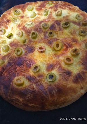 Une photo de Pain au fromage et olives