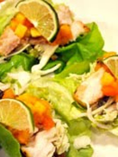 A picture of fish and bacon ranch salad.