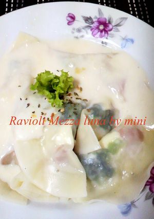 A picture of Mezzaluna Ravioli made with Gyoza Skins.
