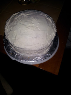 A picture of White Cake with buttercream frosting.
